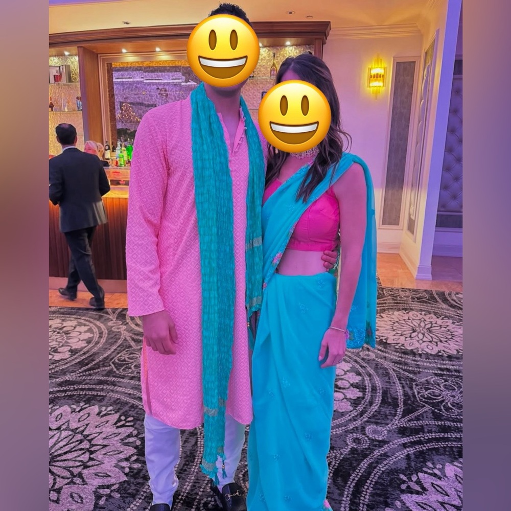 Teal and pink/peach saree